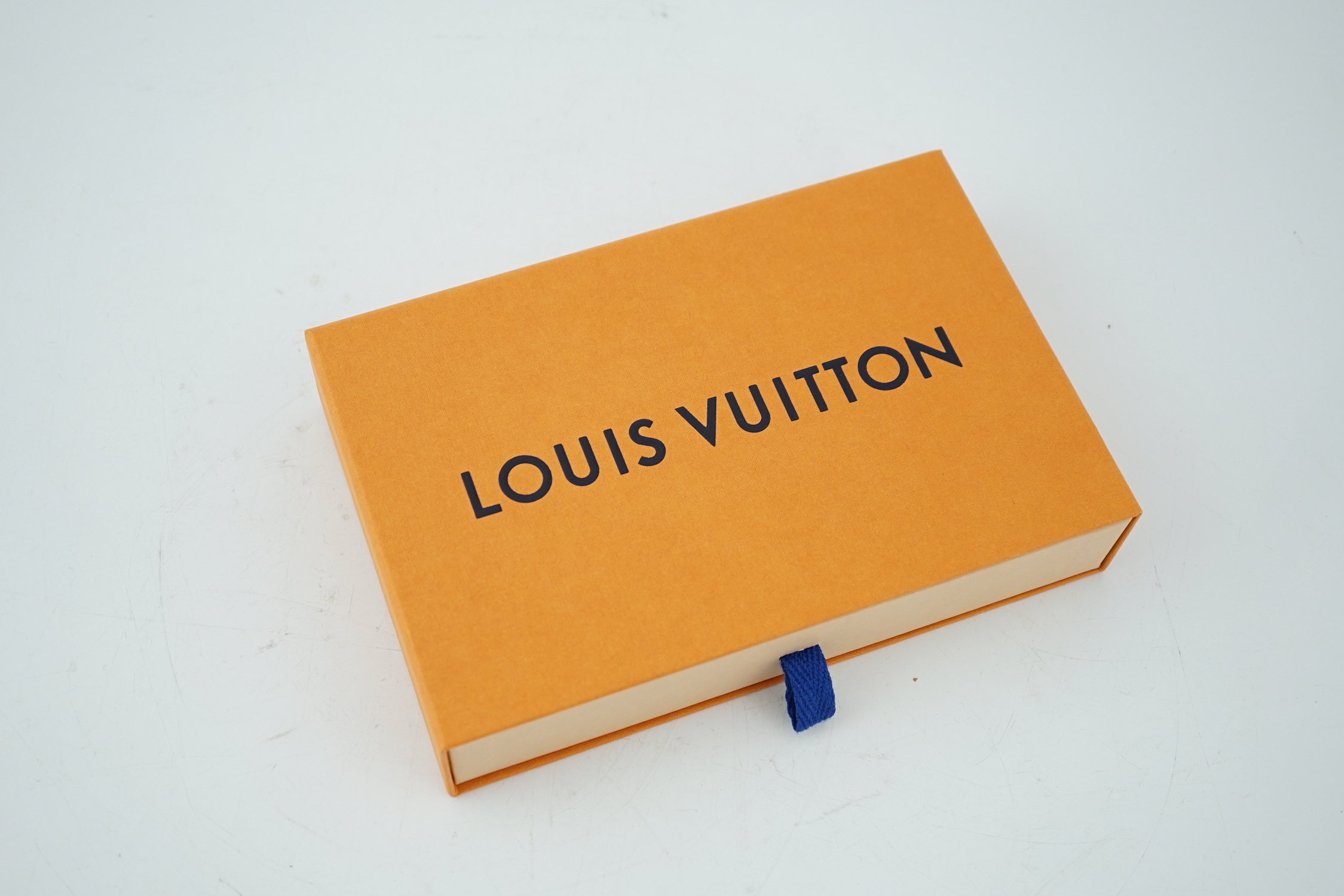 A Louis Vuitton white check mini handbag, height 10cm, width 15cm